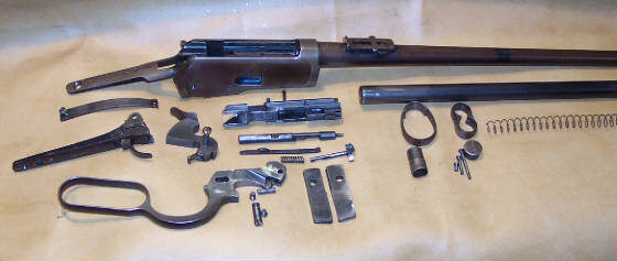 разобранный механизм "winchester " конец 19-го века фото из открытых источников.