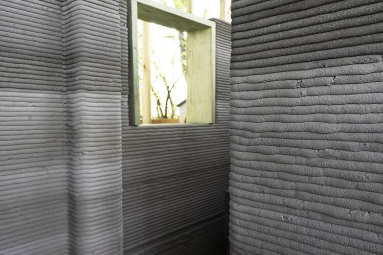 Интерьер 3-D-печатного дома в Остине, штат Техас, показывает слои, типичные для производства присадок. ФОТО: ICON