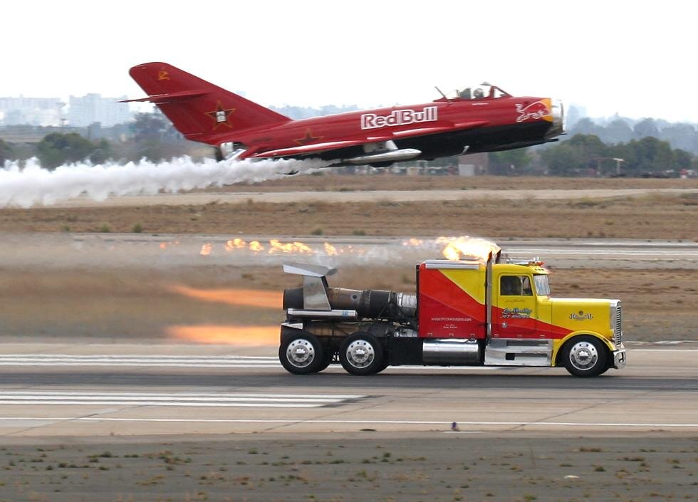 http://wallpaper-wallpapers.com/photos/2584-Shockwave-Jet-Truck-And-Mig.jpg