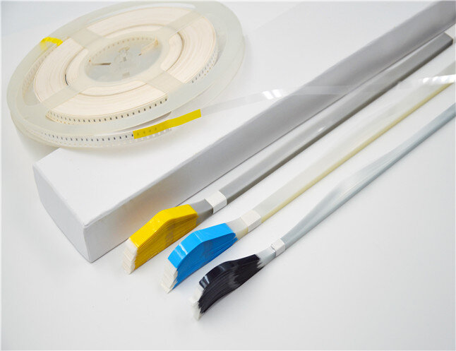 SMD катушка с компонентами и заправочным концом. 3 пачки заправочных концов.