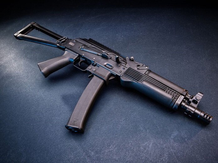  США изготовили 9-миллиметровое полуавтоматическое винтовку KR-9 SBR, изображенное на веб-сайте  завода K-USA. 
