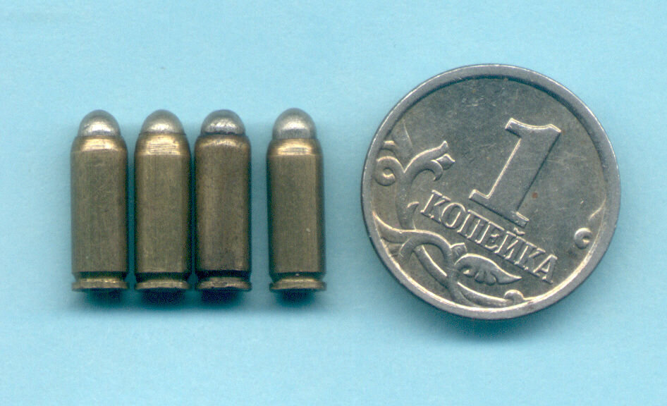 Визуальный пример размера патронов 2,7×9 мм.