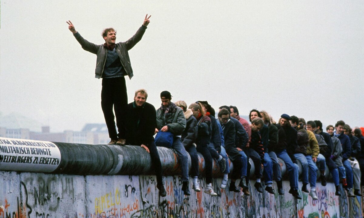 West Germans celebrate the fall of the Berlin wall, November 1989. Photograph: Stephen Jaffe/Getty Images