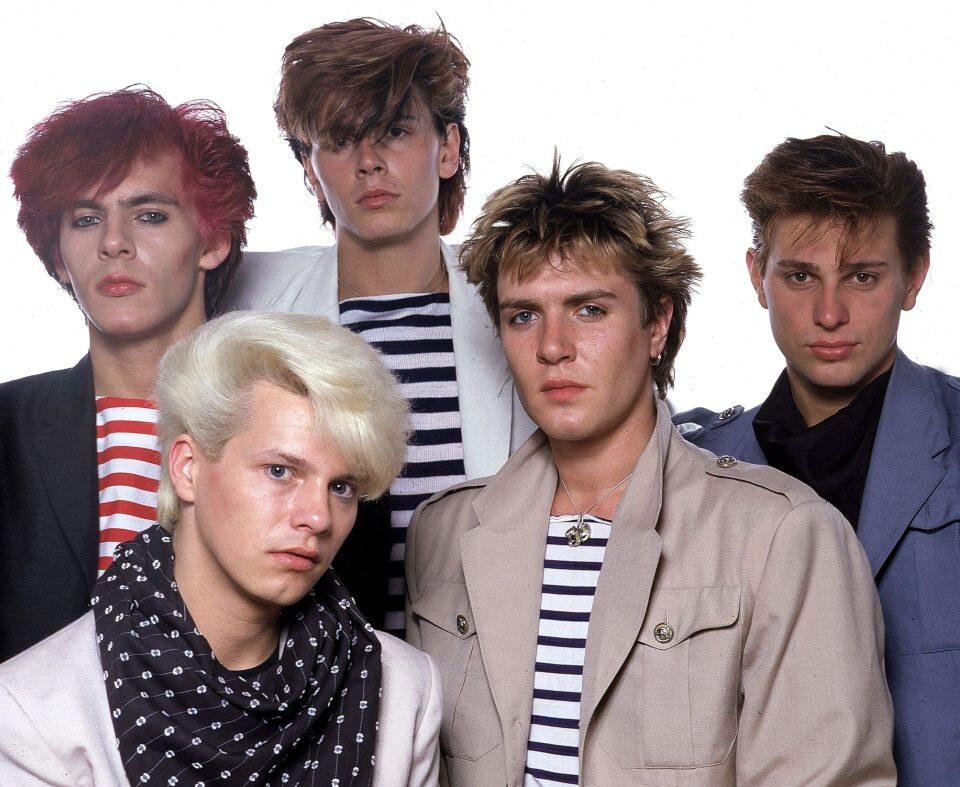 Группа бумажный. Группа Duran Duran. Группа Duran Duran молодые. Duran Duran в 80х. Группа Дюран Дюран сейчас