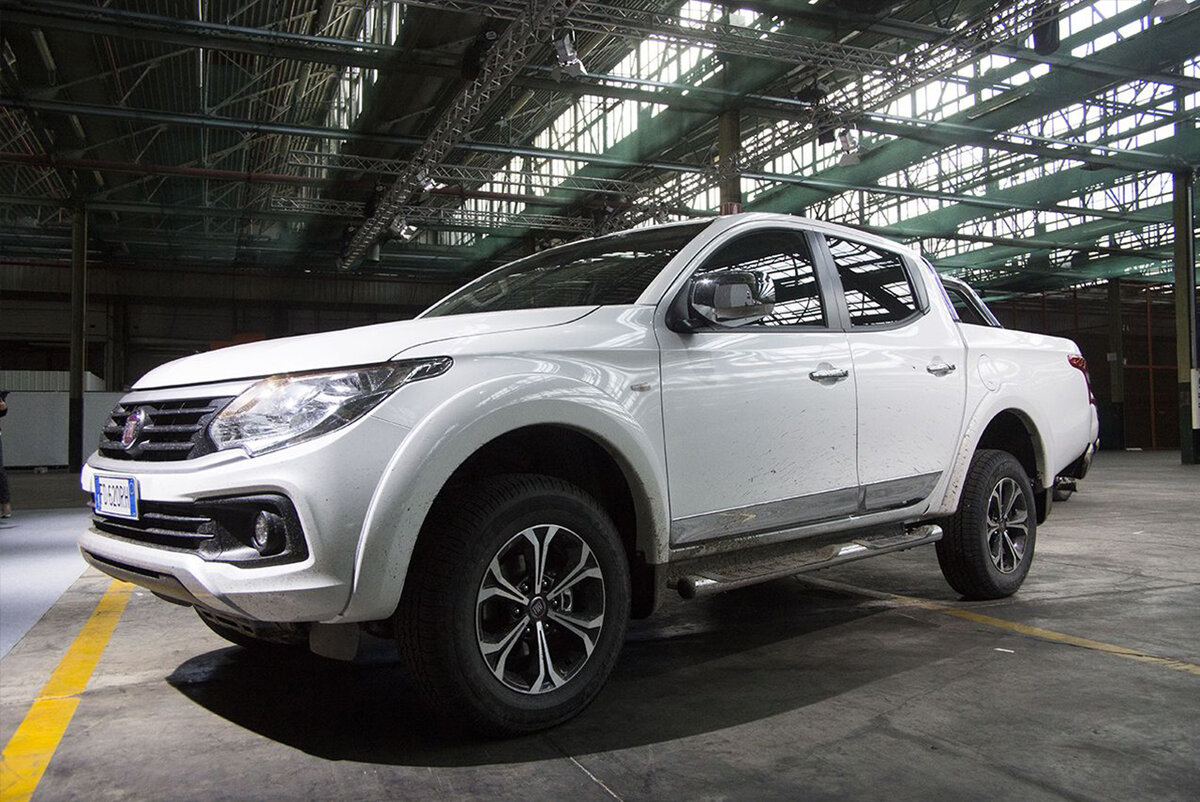 Fiat Fullback. В переводе - полный назад.