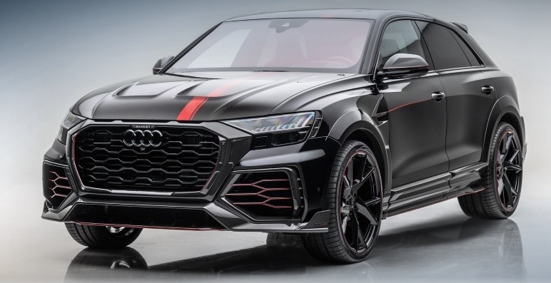 Углепластиковый обвес по меркам фирмы скромный. В пакет включены бамперы, пороги, расширители колёсных арок, решётка радиатора, капот, накладки на зеркала и антикрыло. Все детали несут аэродинамическую функцию. Глубокий чёрный колер разбавлен красной полосой и деталями.