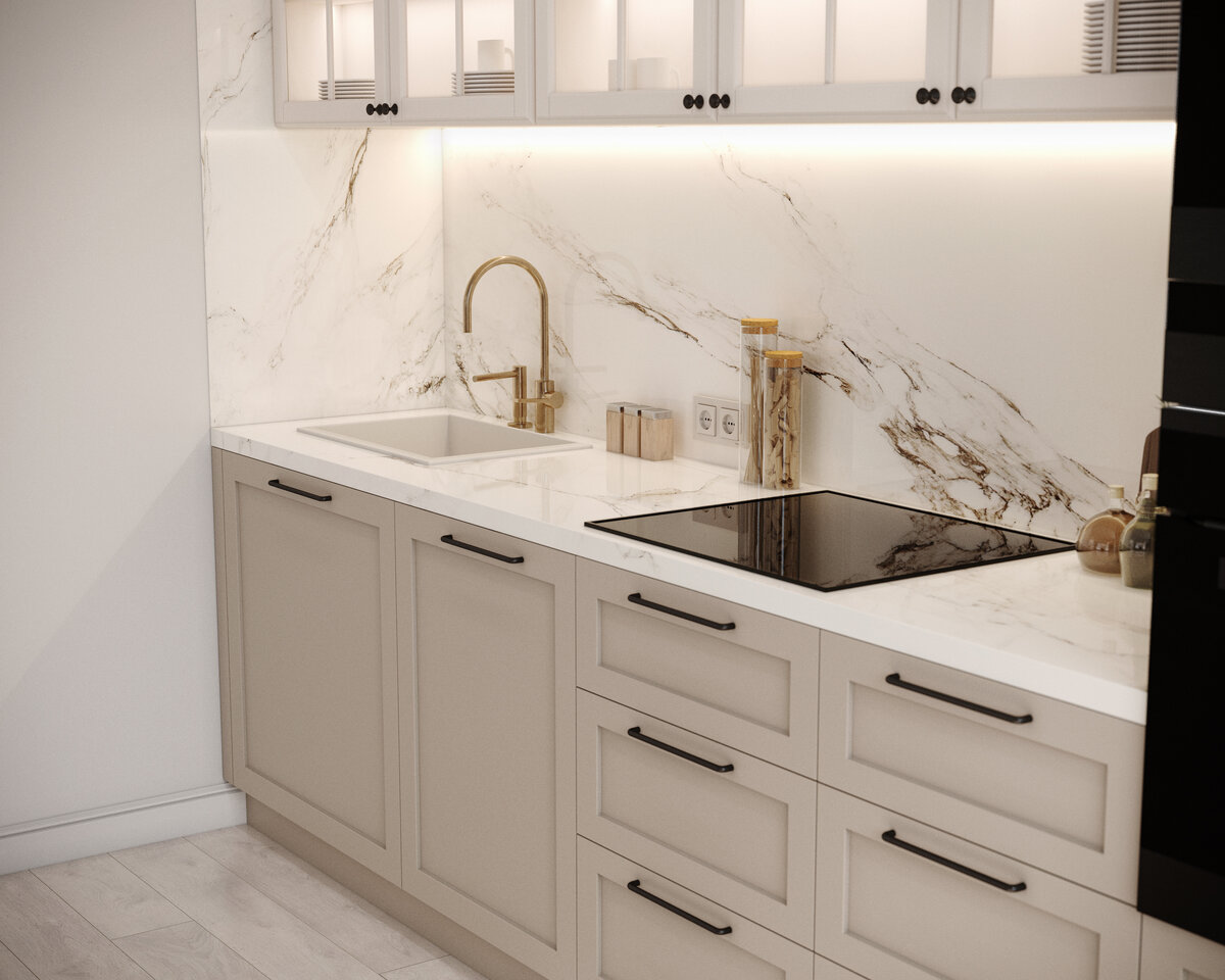 Кухонный гарнитур способен вместить в себя всю необходимую кухонную утварь. Столешница и фартук выполнены из мрамора. А фасады в классическом стиле создают уютную атмосферу. 