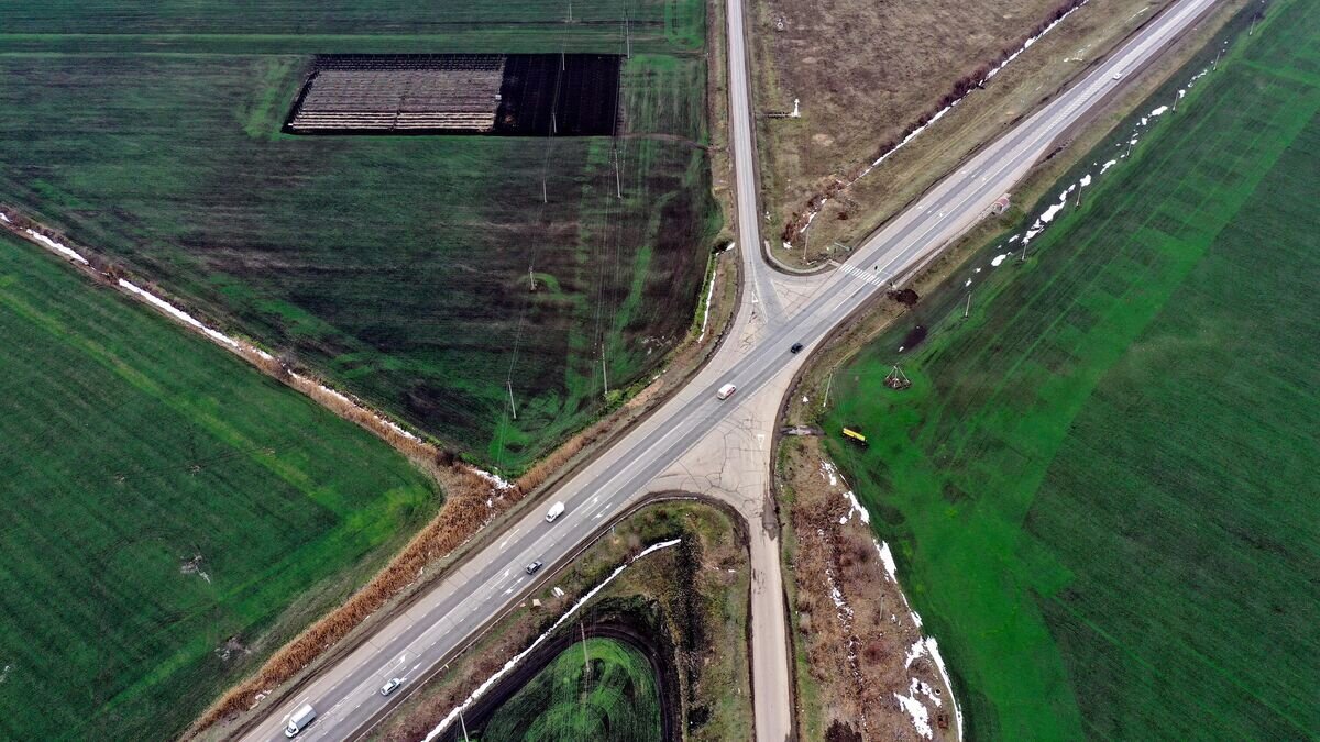    Строительство трассы© РИА Новости / Виталий Тимкив