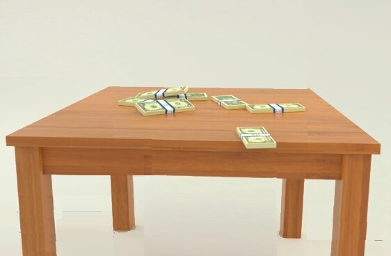 Первые пачки денег на столе с заработков на Дзене