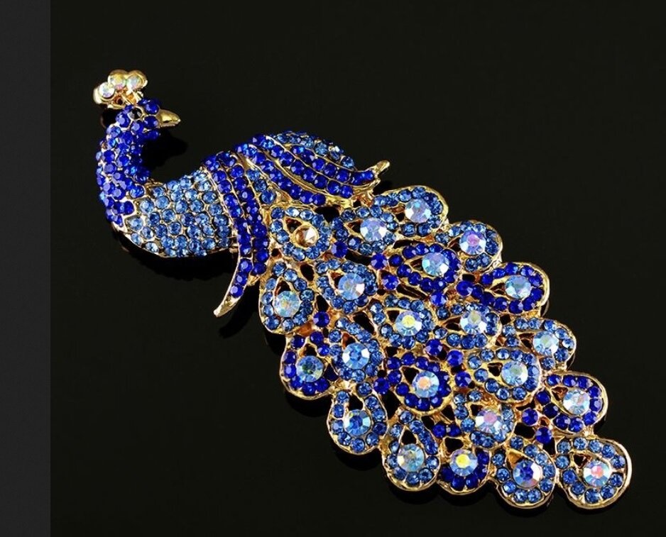 Брошь "Жар-птица". Фото из открытого источника в Яндексе