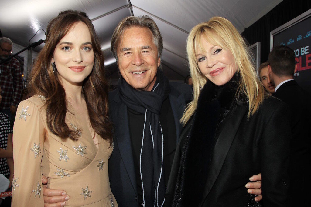 С родителями. Фото из свободного доступа.