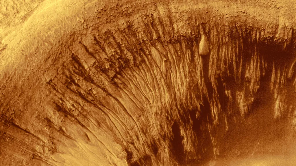 Овраги на стенах кратера Ньютона на Марсе