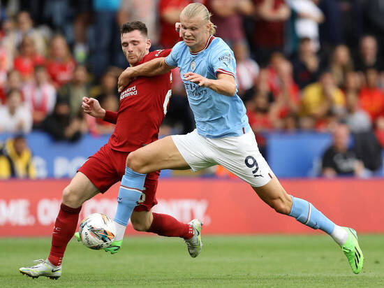     Эндрю Робертсон и Эрлинг Холанд. Фото: Global Look Press/www.imago-images.de.