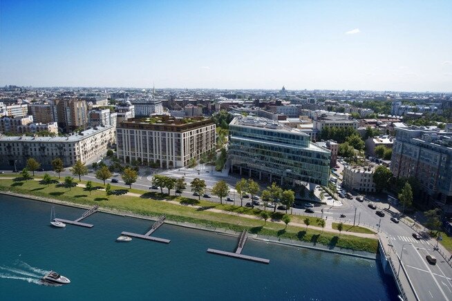 Дом станет продолжением застройки набережной в современном стиле и украсит ее фасадами из натурального гранита и известняка с декором в виде сине-голубых мозаичных вставок.