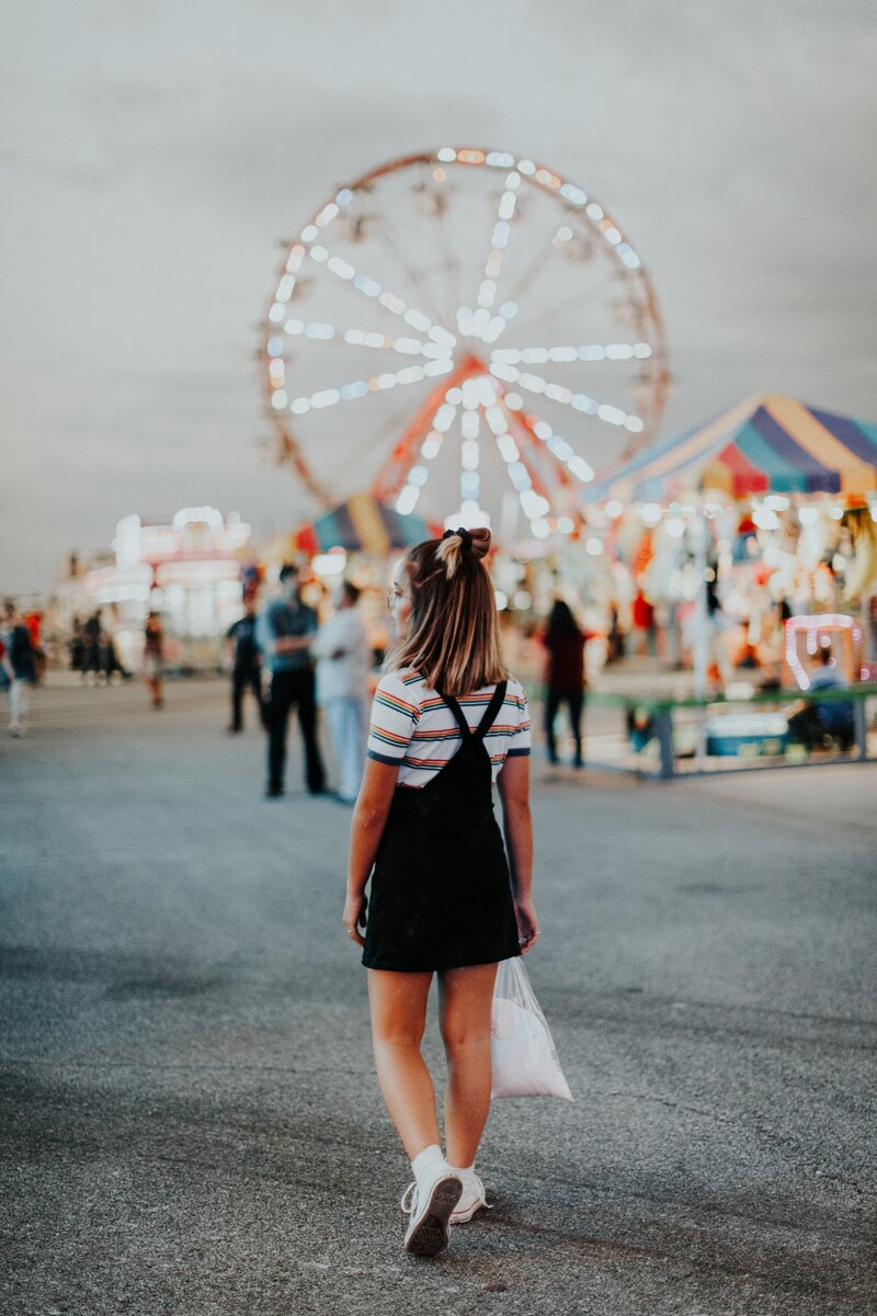 Photo by Hannah Busing on Unsplash This girl has arrived at the amusement park.