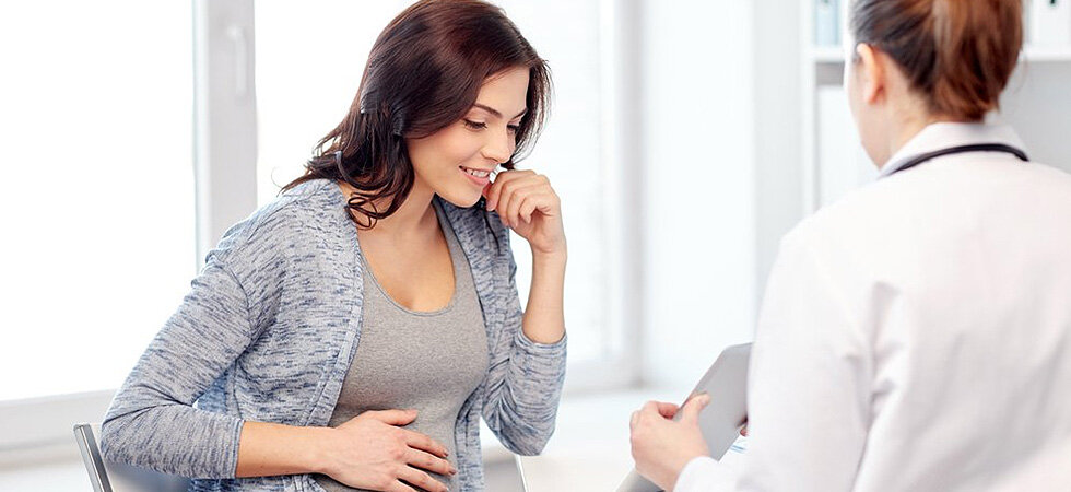 Беременная женщина на приеме у гинеколога
