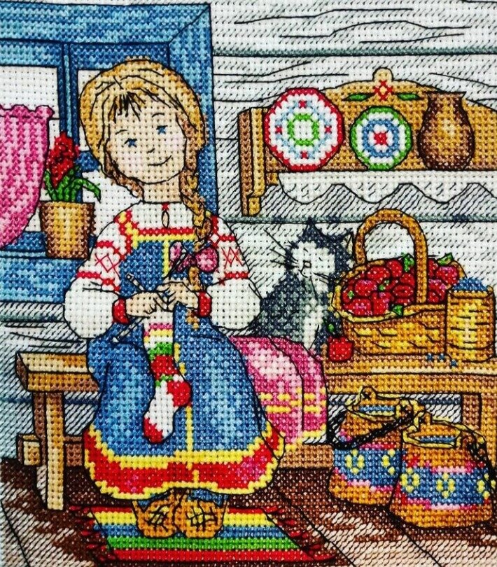 Вышивка «Деревенская девушка». Работа выполнена автором статьи в стиле «счетный крест», «полукрест», «шов назад иголку». 
В низенькой светёлке огонёк горит,  
Молодая пряха под окном сидит. 
Молода. Красива, Карие глаза, 
По плечам развита Русая коса. 
Русая головка, Думы без конца...
Ты о чём мечтаешь, Девица-краса?.. 
