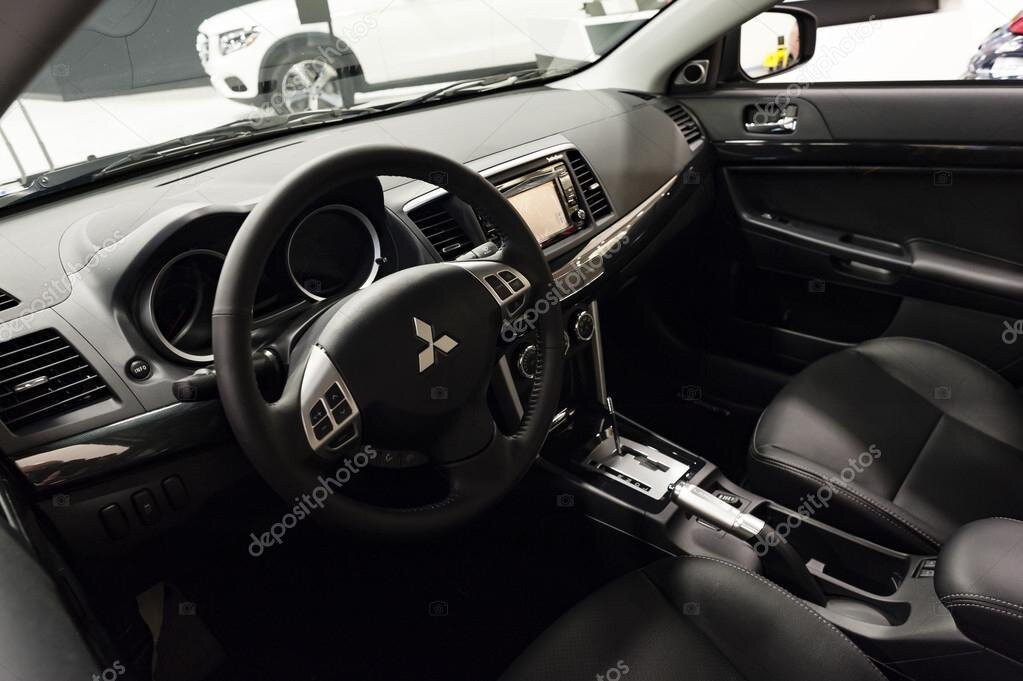 Оплетка на руль на Mitsubishi Lancer 10 из кожи - Купить за 1 руб. в магазине Автоточка