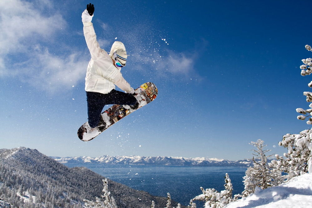 Man holding Snowboard Side