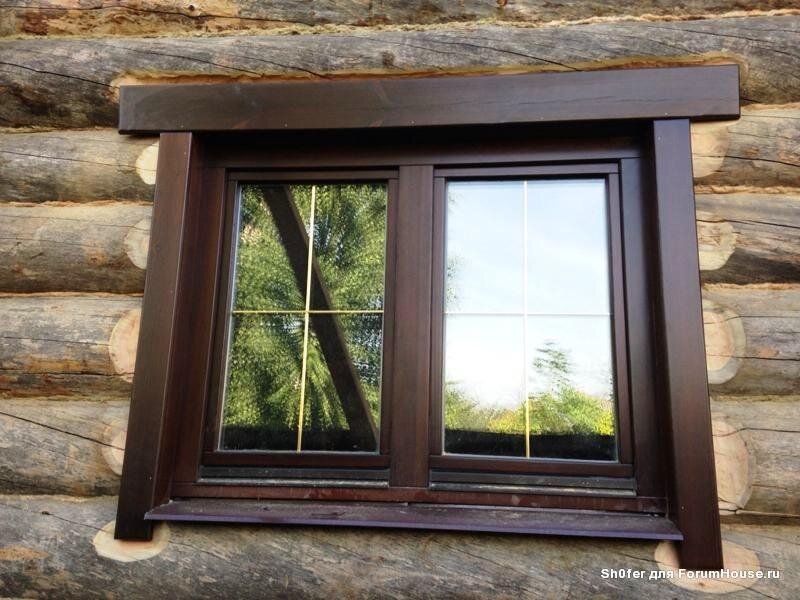 Открытое окно многоэтажки. 25 окон. Тонировка окон солнцезащитной пленкой. Вид из окна. Пластиковые окна под дерево.