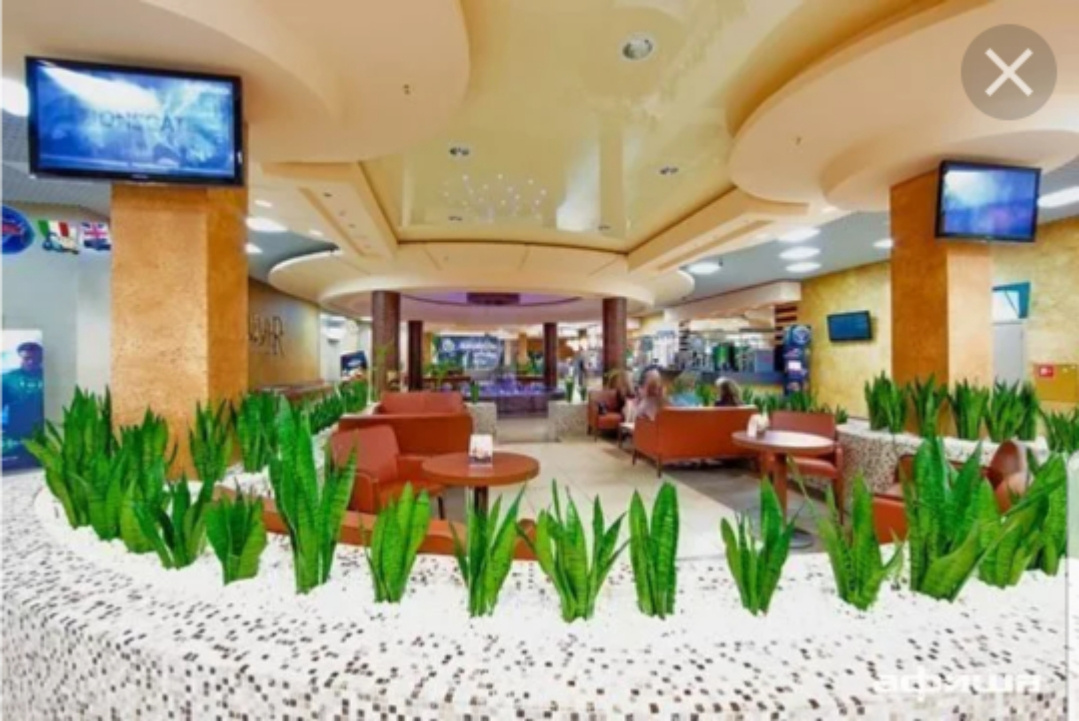 В нашем торговом центре, рядом с кинотеатром 