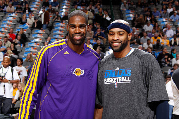 Antawn Jamison #4 of the Los Angeles Lakers and Vince Carter #25 of the Dallas Mavericks pose for a picture before the game on November 24, 2012