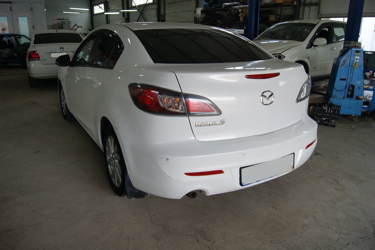 Mazda 3 2 поколения