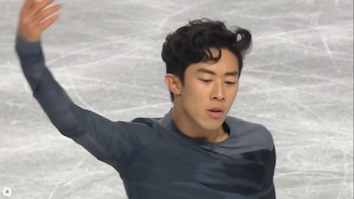 Это победитель Нейтан Чен, у него за короткую программу 106,72 балла, за произвольную - 200,46. Впечатляет!