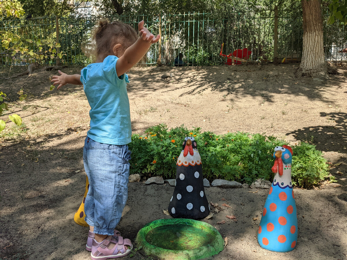 На территории садика.