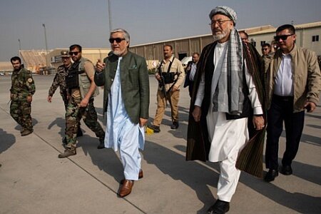 На фото премьер-министр Абдулла Абдулла (в центре). Фото Paula Bronstein/Getty Images