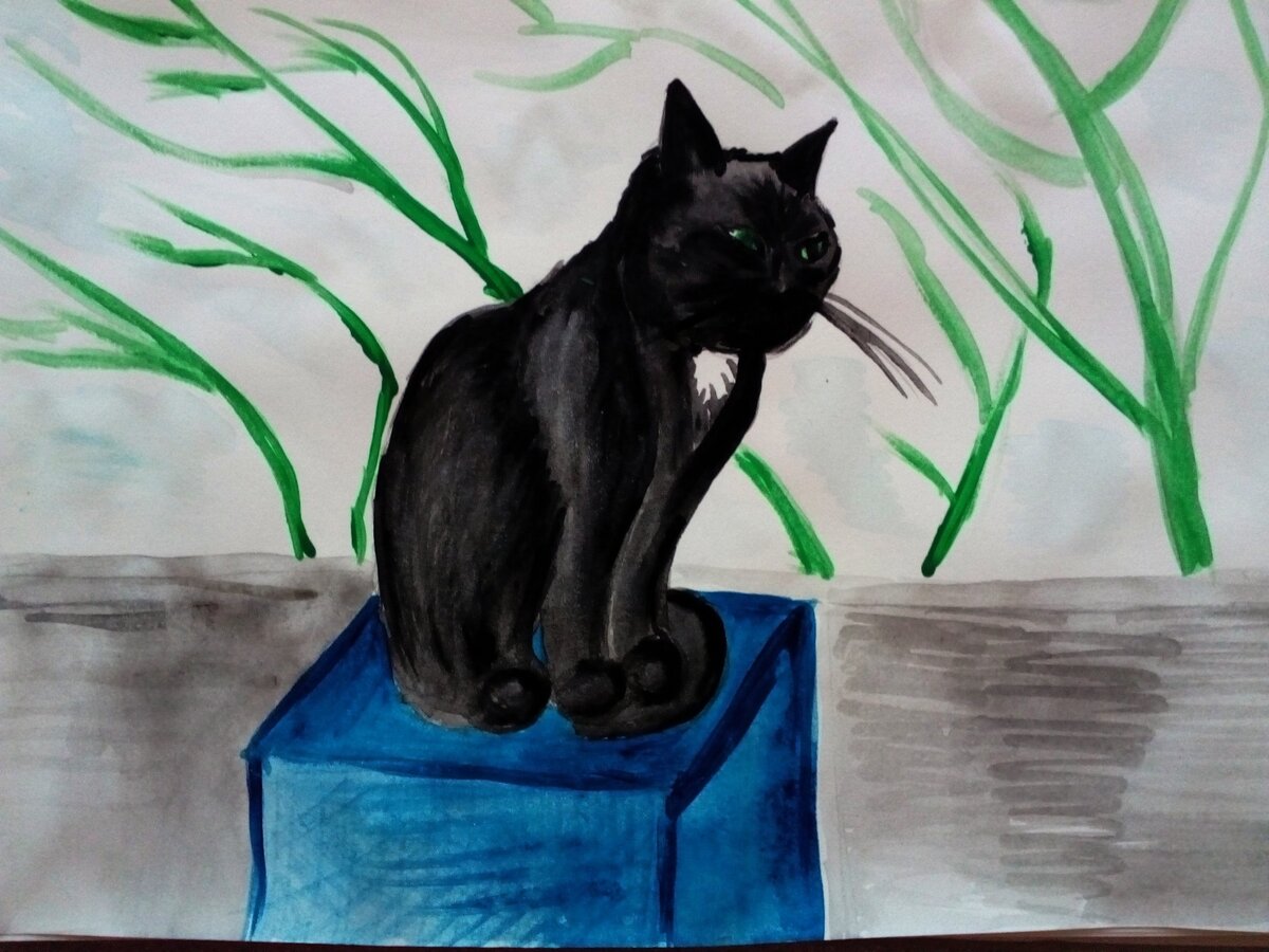 Это чёрный кот сидит на почтовом ящике и охраняет дом.