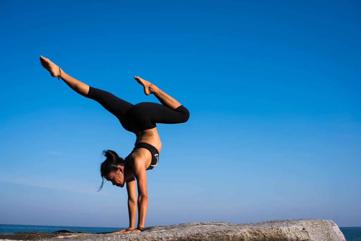 https://www.pexels.com/photo/woman-with-arms-outstretched-against-blue-sky-317155/