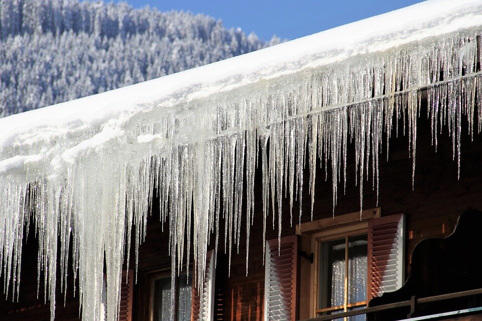 https://pixabay.com/photos/winter-icy-icicle-house-snow-cold-2640632/