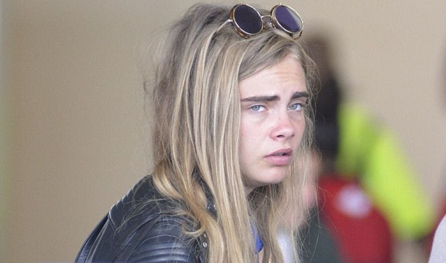 Cara Delevingne явно потрепанная жизнью