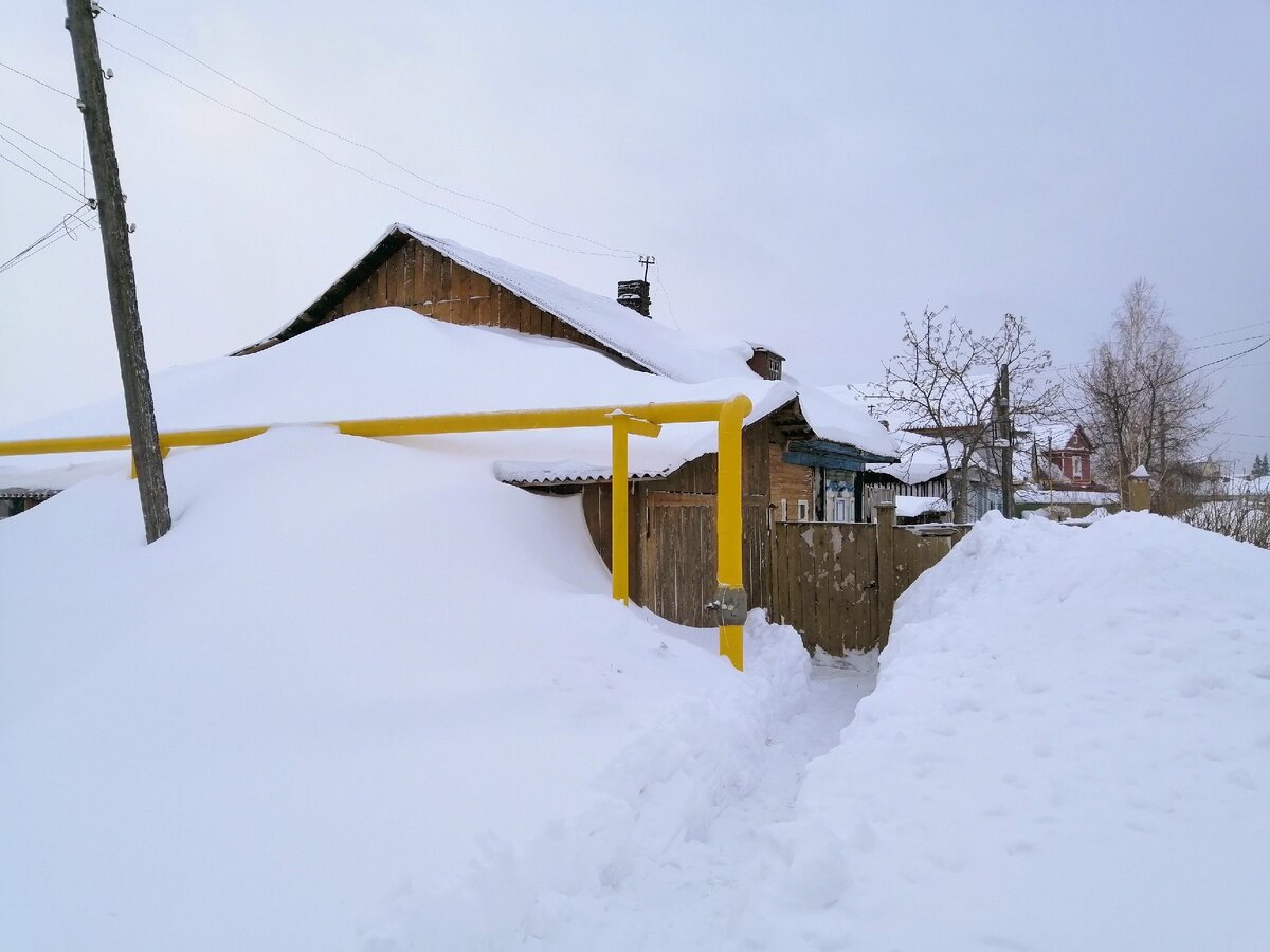 Замело дома по крыши