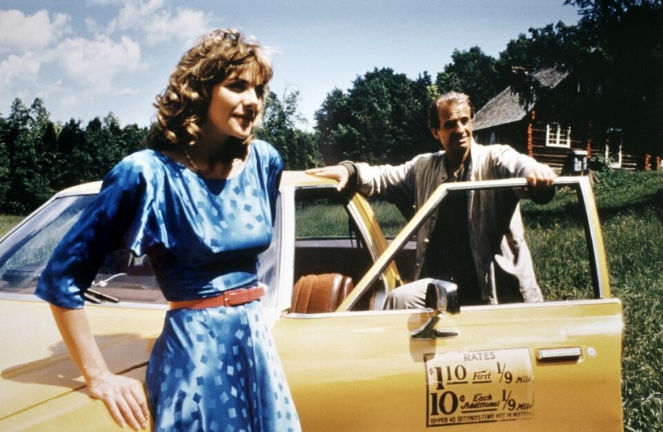 Кадр из фильма “Ограбление” (1985), Ким Кэтролл в роли Лиз и Жан-Поль Бельмондо в роли Гримма