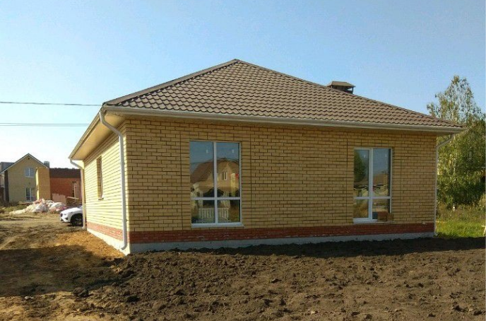 фасады дома отличаются от исходного эскизника решением окон