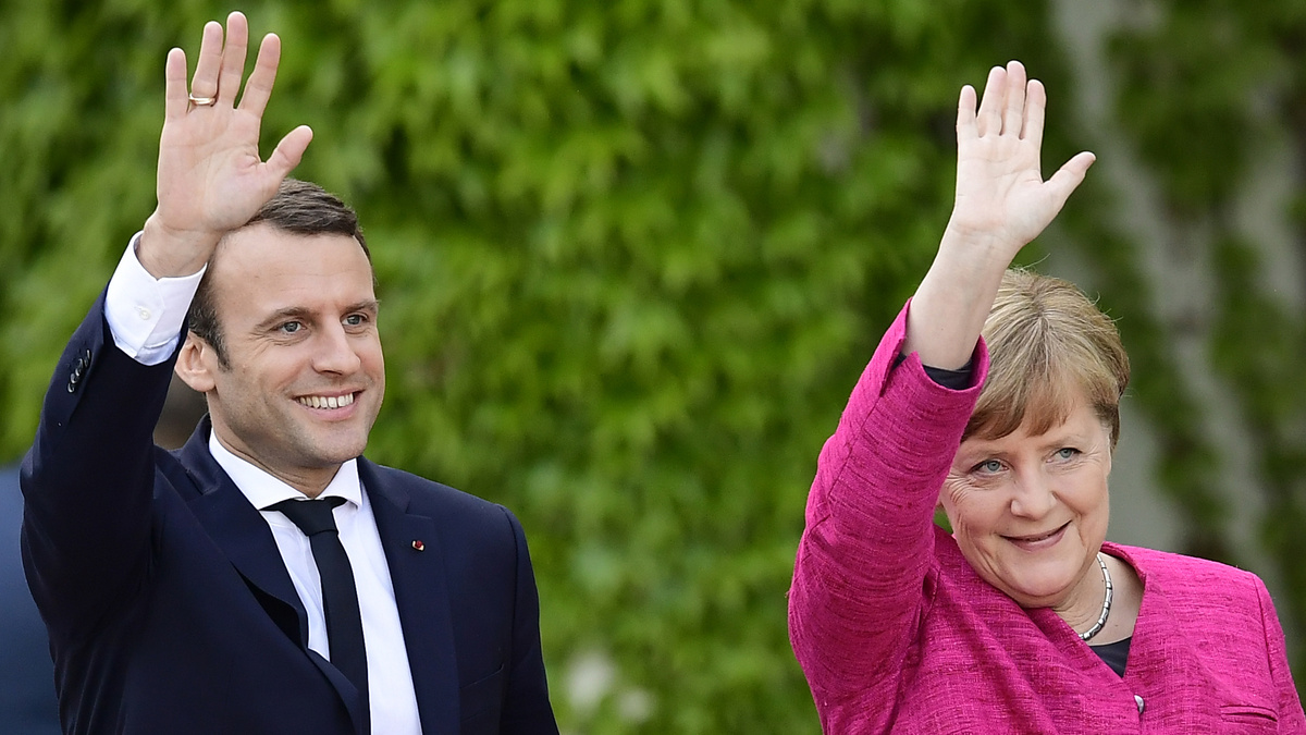 Ангела Меркель и  Эмманюэль Макрон
