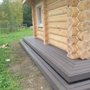 
На фото: устройство отмостки для винтового фундамента