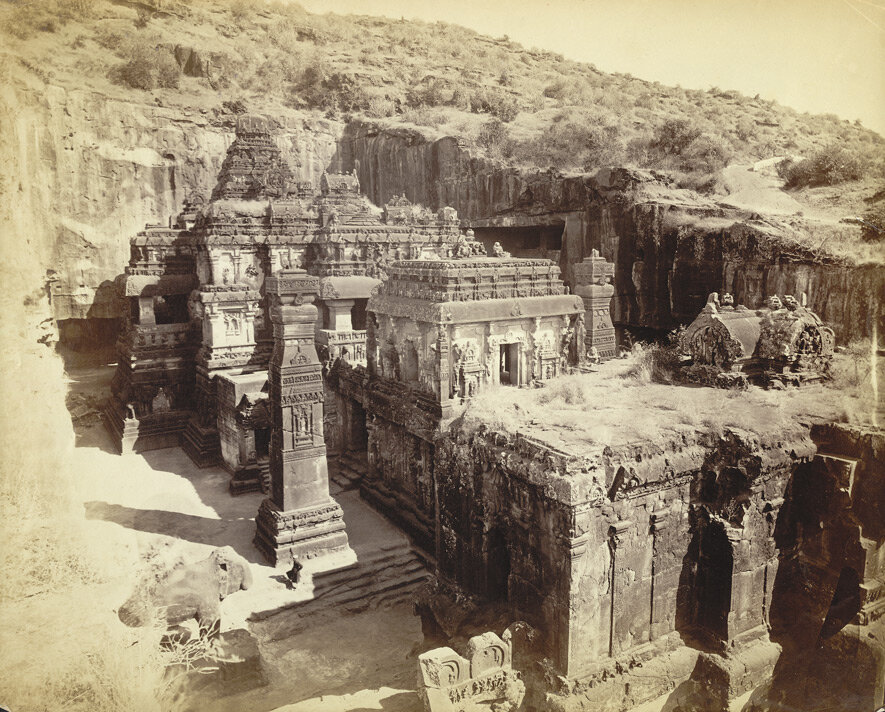 https://upload.wikimedia.org/wikipedia/commons/a/a5/Kailas_fr._hill_N.W._corner_View_of_Hindu_rock-cut_temple%2C_Cave_XVI_Kailasanatha%2C_from_the_north-west_corner%2C_Ellora.%2C_a_photo_by_Henry_Cousens%2C_1870%27s.jpg