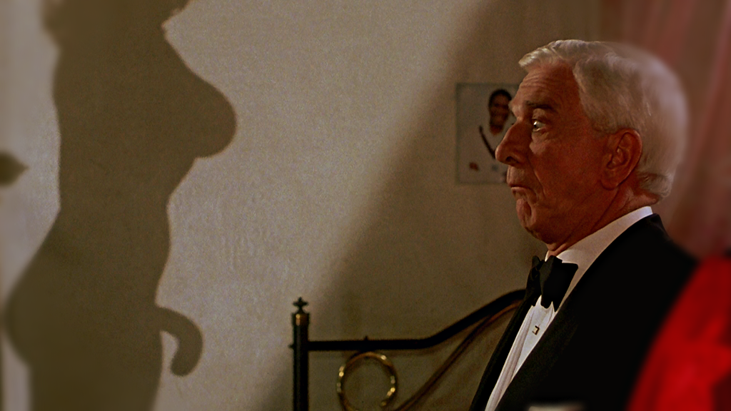 Кадр из фильма “Голый пистолет”