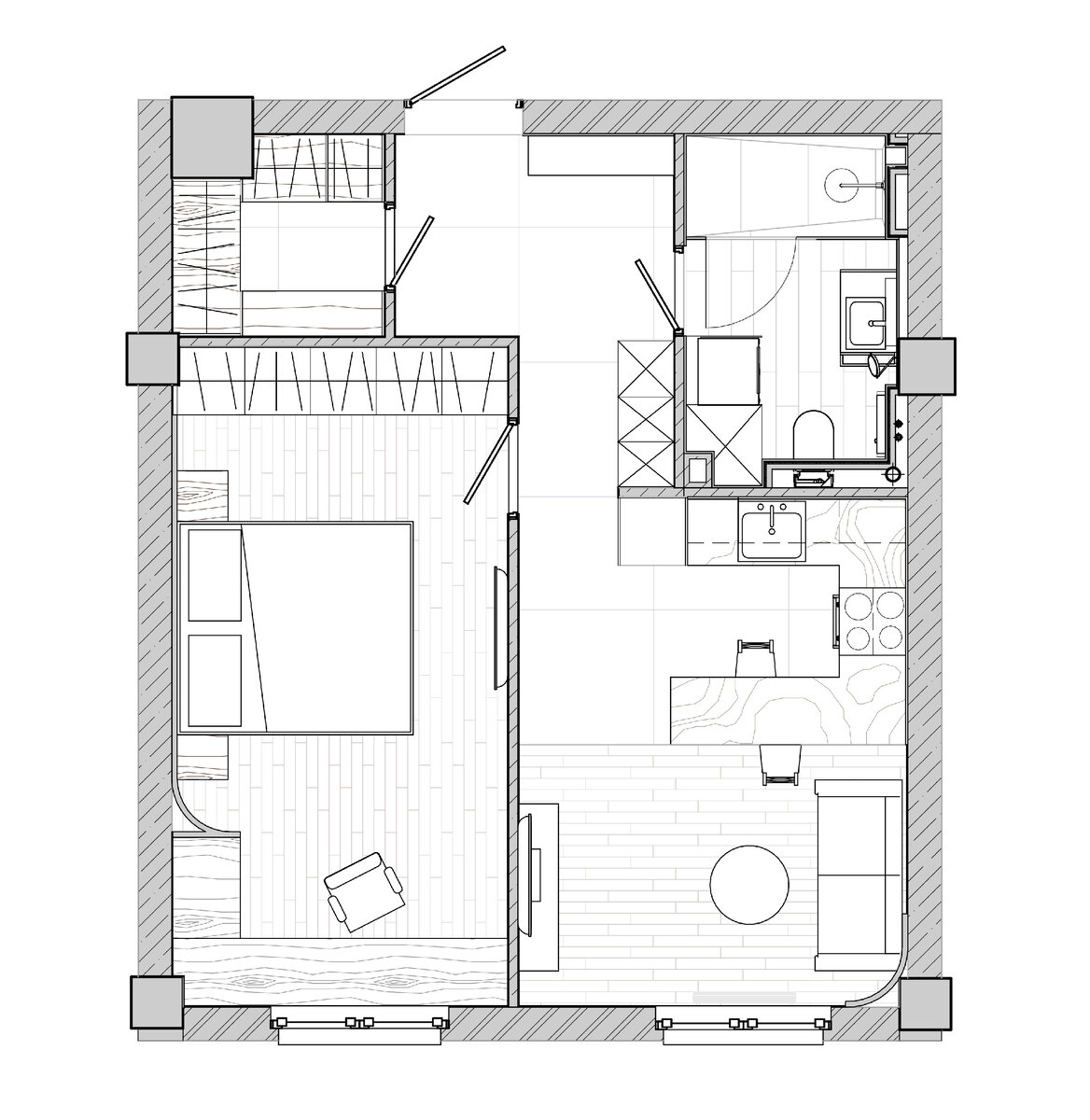 Исходная планировка заказчика устраивала. Чтобы оптимизировать пространство, поменяли только расположение дверей в прихожей. Несмотря на наличие отдельной гардеробной, требовалось организовать дополнительные места для хранения. Эту задачу решают встроенные шкафы.