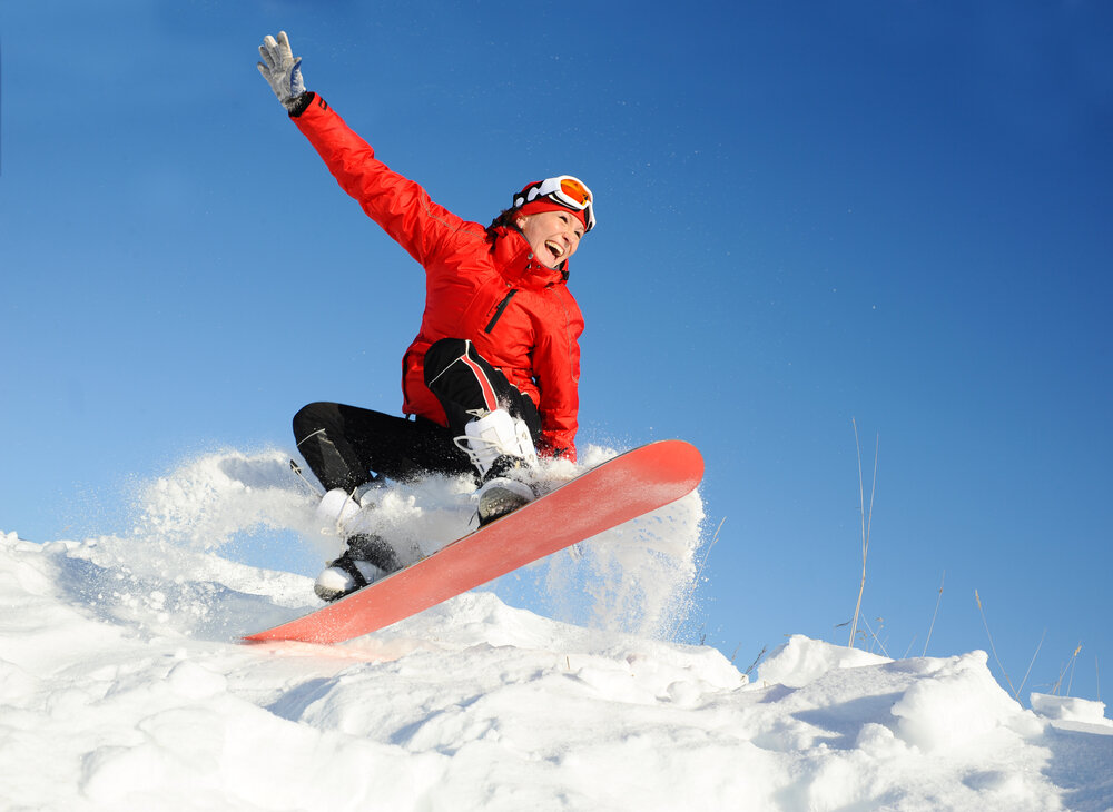 Man holding Snowboard Side