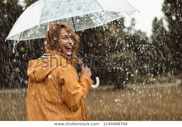 https://image.shutterstock.com/image-photo/cheerful-pretty-girl-holding-umbrella-600w-1145698769.jpg