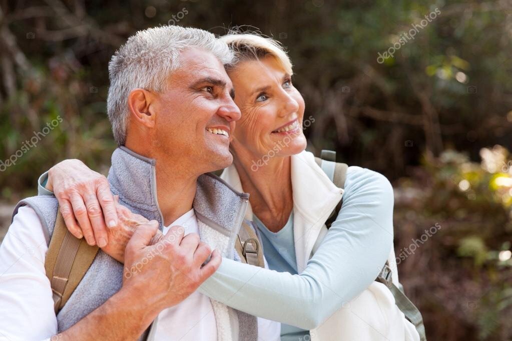 https://st2.depositphotos.com/1011643/8193/i/950/depositphotos_81931712-stock-photo-middle-aged-couple-hugging-in.jpg