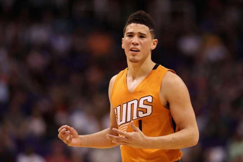 Devin Booker #1 of the Phoenix Suns reacting to a call during the first half of the NBA game against the Portland Trail Blazers, on March 12, 2017