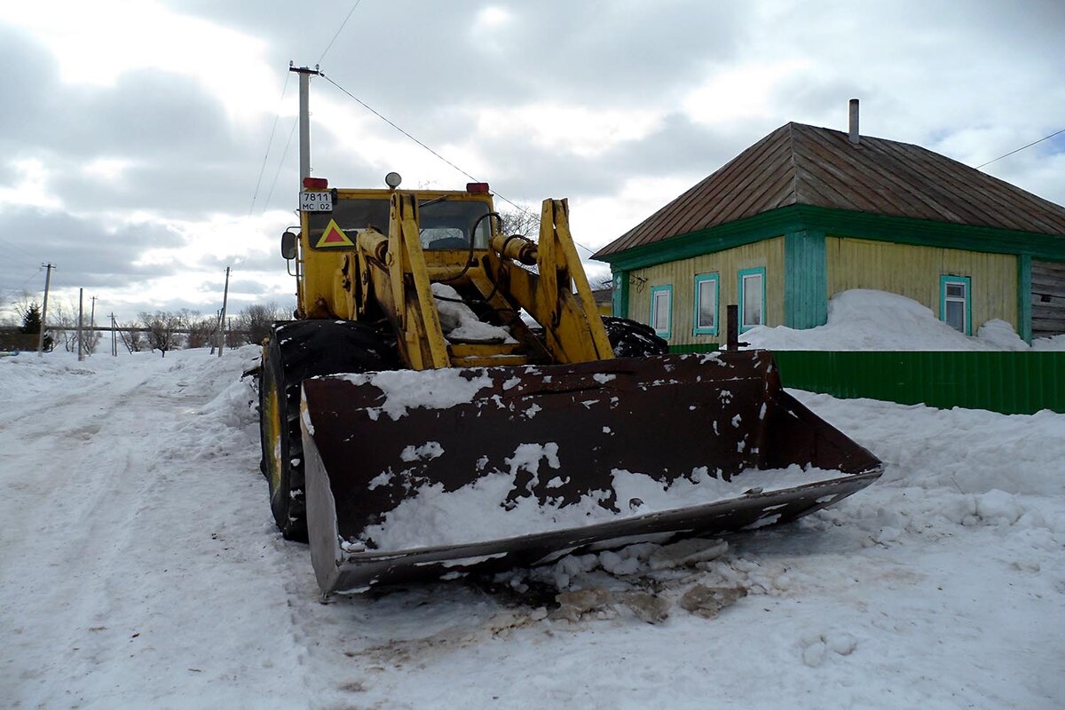 Задний ковш трактора