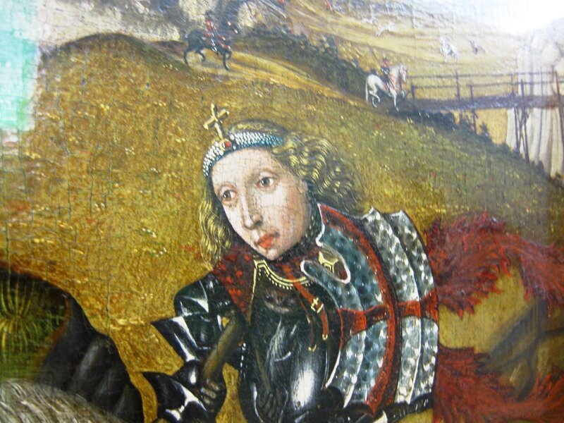 Георгий с удивительно детским лицом, взгляд мечтательный до малахольности (в бою). Отметим, что Георгий жил (если вообще существовал) в III веке нашей эры, поэтому, даже с учетом того, что чудо было явлено посмертно, он вряд ли мог быть одет в рыцарские доспехи. Но ведь доспехи невероятно подходят ко всей этой истории.

