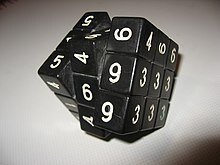 Кубик Рубика
Магический кубикBűvös kockaОсновная информацияИзобретательЭрнё РубикГод выпуска1974Кол-во возможных комбинаций43 252 003 274 489 856 000[1]Число Бога20 ходовФормакубКлассический кубик Рубика 3×3×3 в собранном видеОригинальная упаковка венгерского кубика Рубика, 1982 год5×5×5 (Профессорский кубик)4×4×4 (Месть Рубика, Мастер-кубик)2×2×2 (Карманный кубик)Цифровой вариант Кубика Рубика