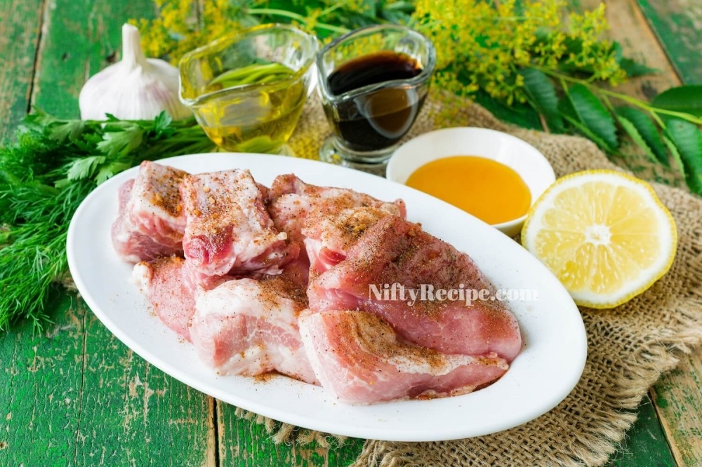 1. Wash pork ribs and dry from excess moisture with paper towels. Cut the meat into serving pieces, salt and season with spices to taste.